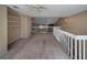 Spacious loft area with high ceilings and carpeting at 3511 Exeter Ct, Orlando, FL 32812