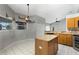 Kitchen boasts granite countertops and oak cabinets at 36737 Antone Dr, Grand Island, FL 32735