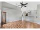 Bright living room with hardwood floors and vaulted ceiling at 36737 Antone Dr, Grand Island, FL 32735