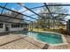 Screened pool and patio with brick pavers at 36737 Antone Dr, Grand Island, FL 32735