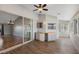 Sunroom with wet bar, sliding doors and wood-look tile at 36737 Antone Dr, Grand Island, FL 32735