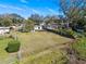 Backyard view of the home and neighboring property at 3710 Sutton Dr, Orlando, FL 32810