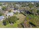 Wide shot of neighborhood with lake view at 3710 Sutton Dr, Orlando, FL 32810