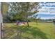 Large backyard with pond view at 3710 Sutton Dr, Orlando, FL 32810