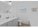 Updated bathroom with tub, toilet and vanity at 3710 Sutton Dr, Orlando, FL 32810