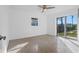 Bedroom with sliding glass doors and backyard access at 3710 Sutton Dr, Orlando, FL 32810