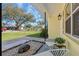 Relaxing front porch with seating and landscaping at 3710 Sutton Dr, Orlando, FL 32810