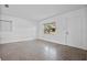 Bright living room featuring terrazzo floors and a view at 3710 Sutton Dr, Orlando, FL 32810