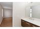 Bright bathroom with white vanity and modern fixtures at 3886 Lake Mirage Blvd, Orlando, FL 32817