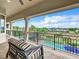 Covered balcony overlooking the golf course and pool at 395 Muirfield Loop, Reunion, FL 34747