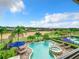 Luxury pool and spa with stunning golf course views at 395 Muirfield Loop, Reunion, FL 34747