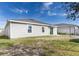 Spacious backyard with large grassy area at 445 N Andrea Cir, Haines City, FL 33844