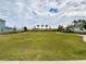 Expansive green lawn with benches and walking paths at 4457 Lions Gate Ave, Clermont, FL 34711