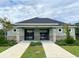 Community pool house with access gates at 4457 Lions Gate Ave, Clermont, FL 34711