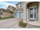 Front entrance with a light blue door and glass inserts at 4457 Lions Gate Ave, Clermont, FL 34711