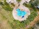 Arial view of a community pool with a unique design at 4731 Clock Tower Dr # 203, Kissimmee, FL 34746