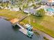 Community dock with kayaks and paddleboards for resident use at 4731 Clock Tower Dr # 203, Kissimmee, FL 34746