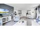 Living area featuring white furniture and a view into the kitchen and dining area at 4823 Cranberry Way, Lakeland, FL 33811