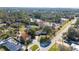 Home's aerial view showcasing its location near a road and body of water at 501 S Lacy Cir, Deltona, FL 32725