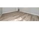 Spacious bedroom featuring light wood-look flooring at 501 S Lacy Cir, Deltona, FL 32725