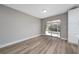 Dining area with sliding doors leading to the patio at 501 S Lacy Cir, Deltona, FL 32725