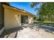 Rear exterior view with sliding glass doors to patio at 501 S Lacy Cir, Deltona, FL 32725