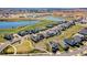 Aerial view of a new home community with lake and conservation at 5157 Citrus Leaf Blvd, Winter Garden, FL 34787