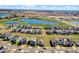 Aerial view of a luxury home community near a lake at 5157 Citrus Leaf Blvd, Winter Garden, FL 34787