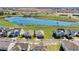 Aerial view of houses near a lake in a new community at 5157 Citrus Leaf Blvd, Winter Garden, FL 34787