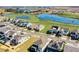 Aerial view of houses near a lake in a new community at 5157 Citrus Leaf Blvd, Winter Garden, FL 34787