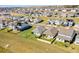 Aerial view of a residential community with houses and solar panels at 5157 Citrus Leaf Blvd, Winter Garden, FL 34787