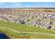 Aerial view of a large community with houses and a lake at 5157 Citrus Leaf Blvd, Winter Garden, FL 34787