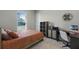 Bedroom with a queen bed, workspace and ample closet space at 5157 Citrus Leaf Blvd, Winter Garden, FL 34787