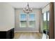 Bright dining room with sliding door access to patio at 5157 Citrus Leaf Blvd, Winter Garden, FL 34787