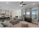 Living room with large windows and plenty of natural light at 5157 Citrus Leaf Blvd, Winter Garden, FL 34787