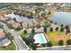 Aerial view of neighborhood pool and playground at 528 Legacy Park Dr, Casselberry, FL 32707