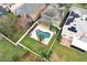 Aerial view of house with pool and solar panels at 528 Legacy Park Dr, Casselberry, FL 32707