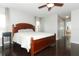 Spacious bedroom with dark wood floors and ceiling fan at 528 Legacy Park Dr, Casselberry, FL 32707