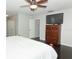 Bright bedroom with large TV and ceiling fan at 528 Legacy Park Dr, Casselberry, FL 32707