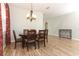 Dining room featuring a wood table and chandelier, hardwood floors at 528 Legacy Park Dr, Casselberry, FL 32707