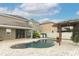 Relaxing kidney-shaped pool with pergola and patio at 528 Legacy Park Dr, Casselberry, FL 32707