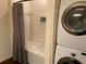 Stackable washer and dryer in a conveniently located laundry room at 5352 Diplomat Ct # 103, Kissimmee, FL 34746