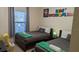 Fun ' room with two twin beds and a playful Mario theme at 5352 Diplomat Ct # 103, Kissimmee, FL 34746