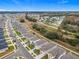 Aerial view of a residential neighborhood with houses and a railway at 5381 Maddie Dr, Haines City, FL 33844