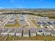 Aerial view of neighborhood showcasing various houses and landscape at 5381 Maddie Dr, Haines City, FL 33844