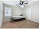 Bedroom with ceiling fan and neutral decor at 5381 Maddie Dr, Haines City, FL 33844