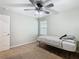 Bedroom with ceiling fan and neutral decor at 5381 Maddie Dr, Haines City, FL 33844