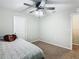 Spacious bedroom with ceiling fan and neutral decor at 5381 Maddie Dr, Haines City, FL 33844