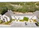 Aerial image of townhouses with parking and surrounding trees at 549 Sun Ridge Pl # 104, Altamonte Springs, FL 32714