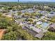 Aerial view of community with pool, tennis court, and townhouses at 549 Sun Ridge Pl # 104, Altamonte Springs, FL 32714